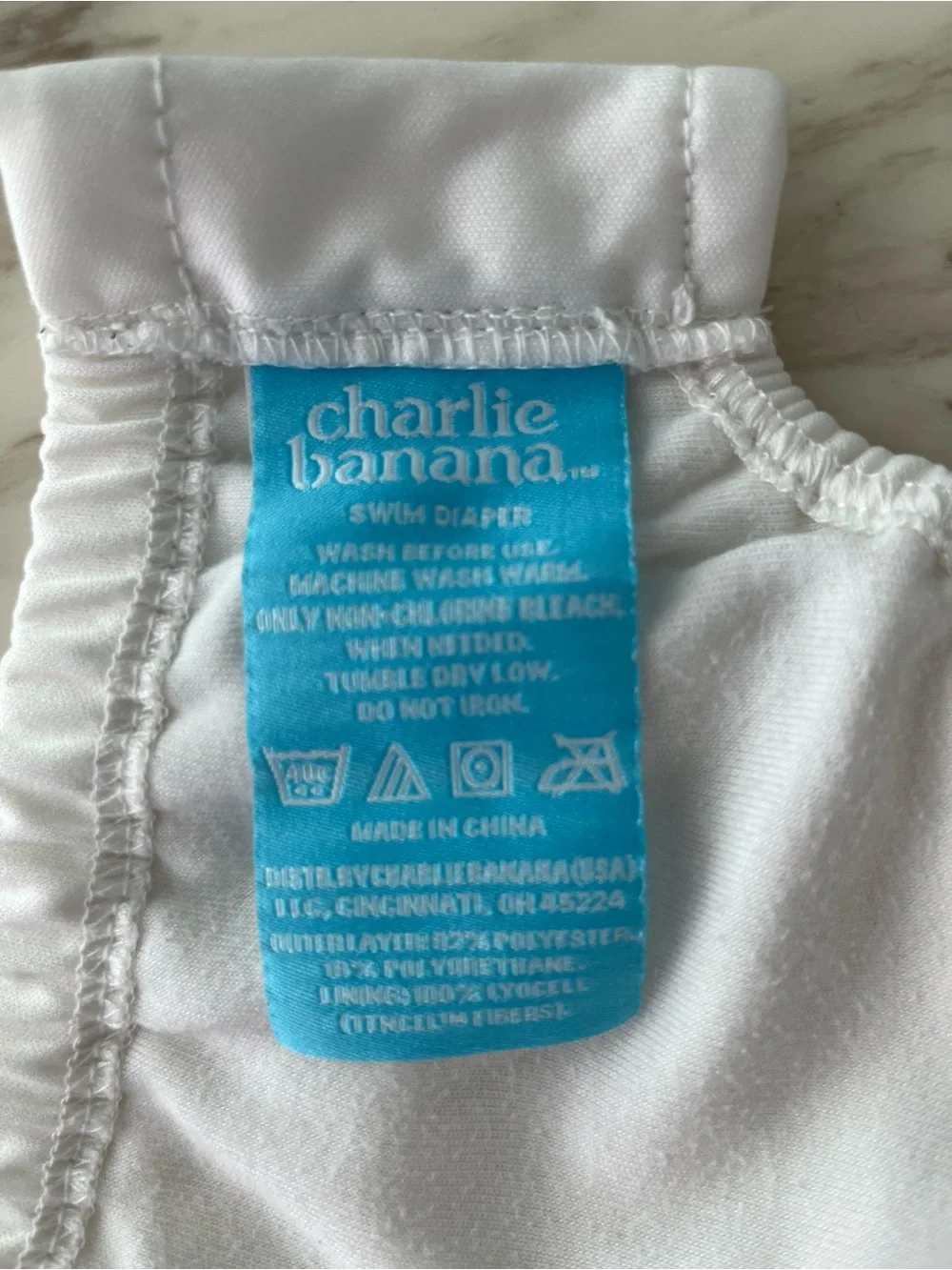 Charlie Banana White Swim Diaper Cover with Blue Logo Patch